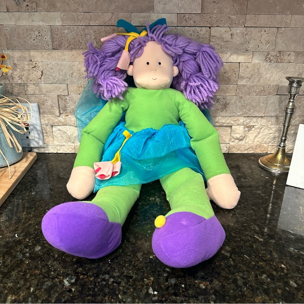 Whimsical Plush Doll with Green and Purple Outfit
